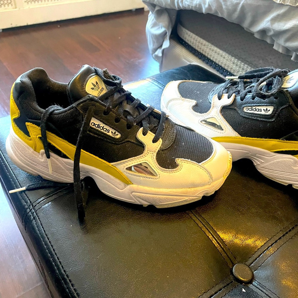 Black and yellow adidas